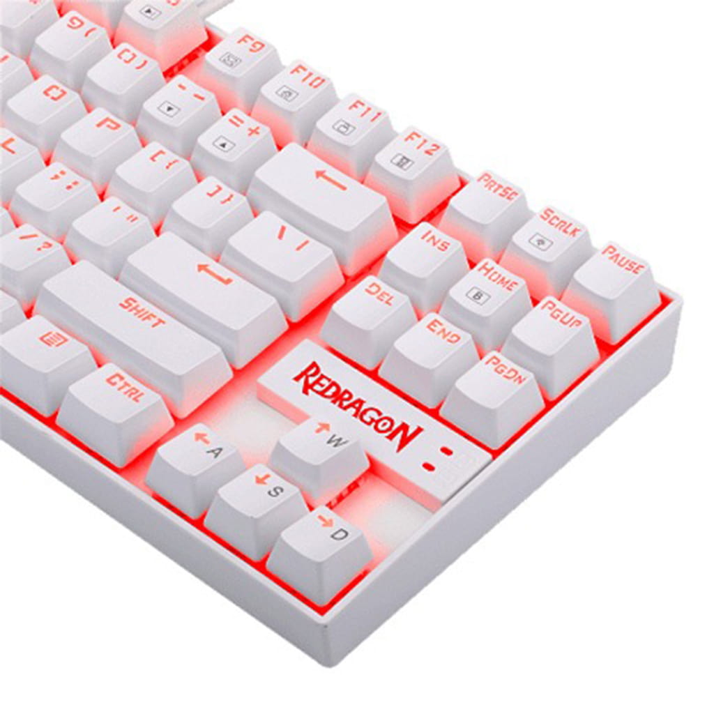 Close-up view of the white Redragon K552W Kumara RGB mechanical keyboard keys with red backlighting.