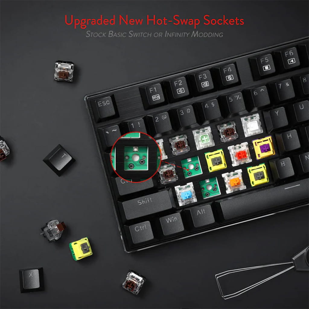 Redragon K556 Devarajas Mechanical Gaming Keyboard demonstrating its hot-swappable switch capability with a switch being removed