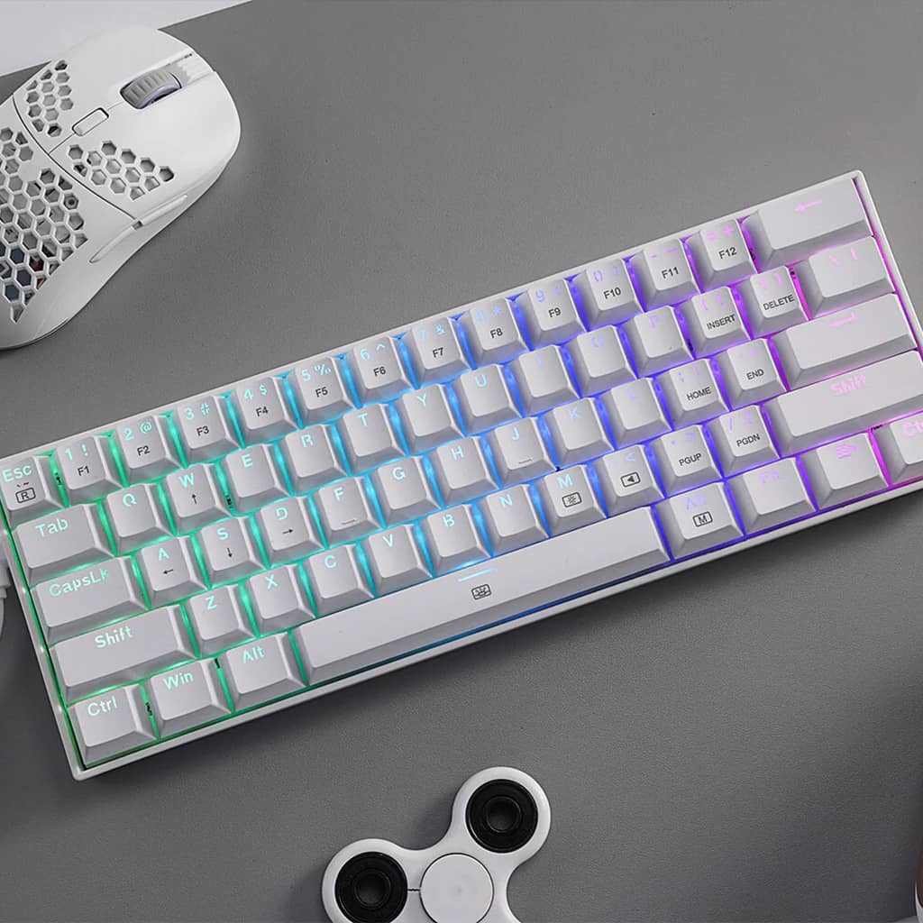 Top view of Redragon K630 Dragonborn White Compact mechanical keyboard with a white honeycomb gaming mouse