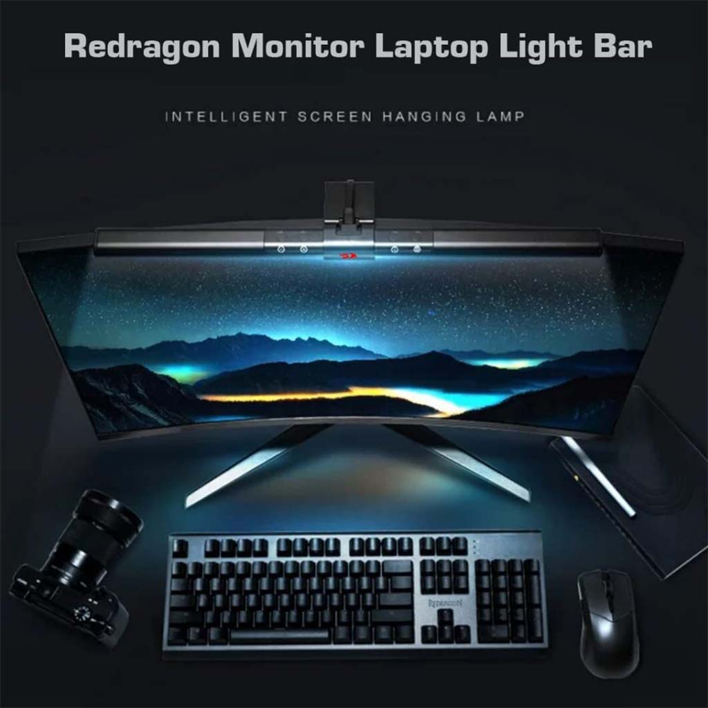 A curved monitor with a night sky image, lit by a Redragon gml 113 light bar at top