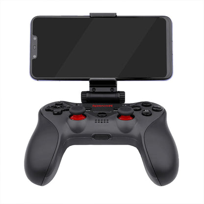 Black gaming controller with smartphone mount on a white background