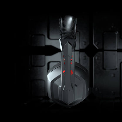 Side view sleek black Redragon H120 Ares gaming headset showing earcup and red accents