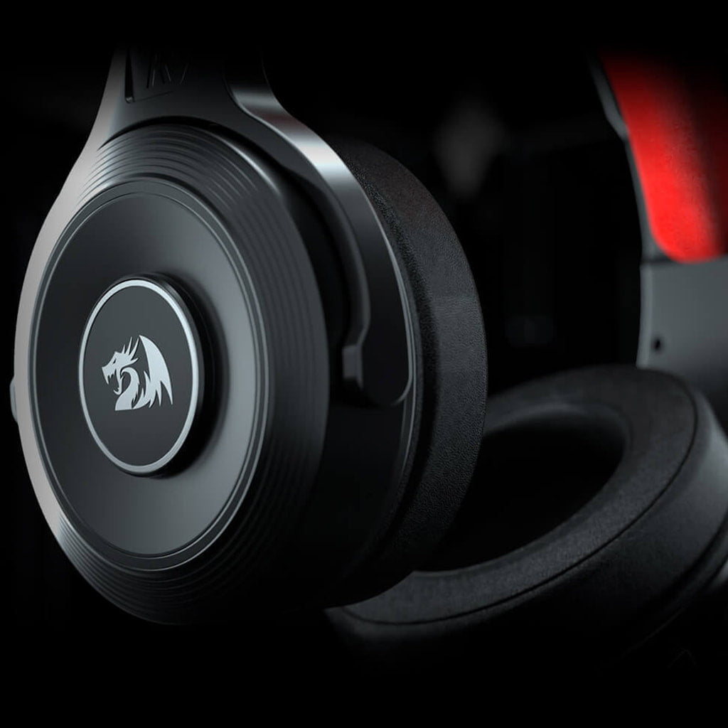 Redragon H818 Pelops black gaming headset earcup showing material texture and logo