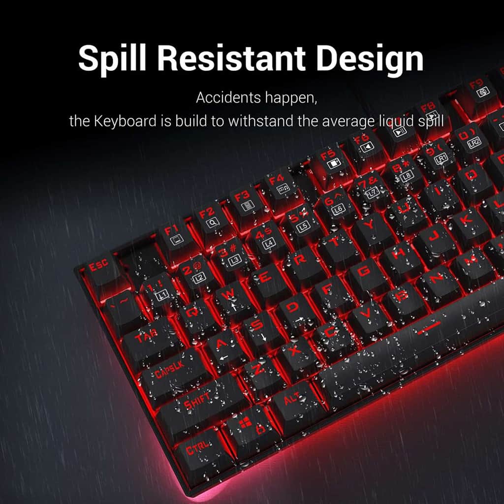 Redragon K552 Red Kumara mechanical keyboard with water droplets on the keys, demonstrating its spill-resistant design.

