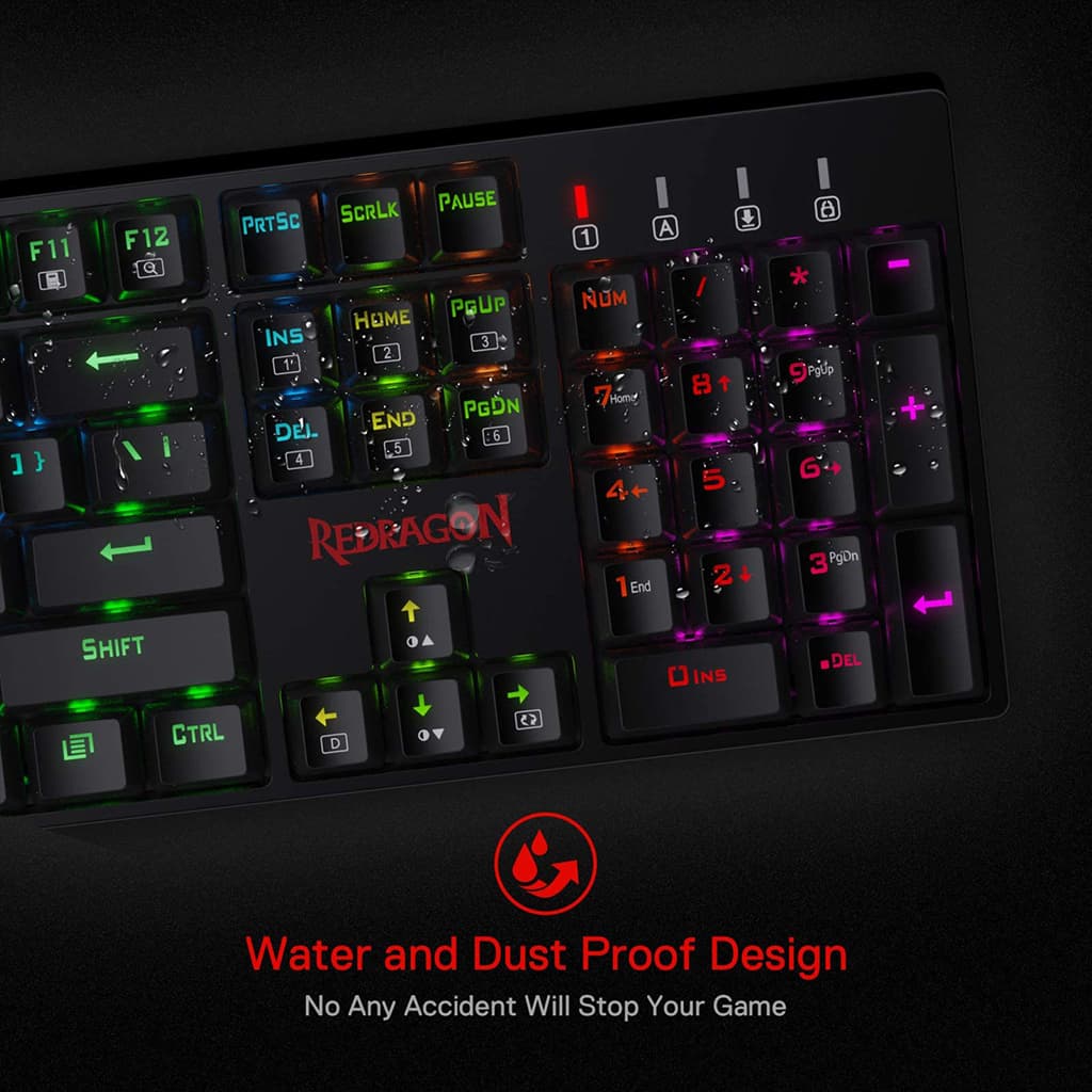 Close-up of a Redragon K582 keyboard, featuring waterproof and dustproof design, with colorful backlit keys and water droplets visible