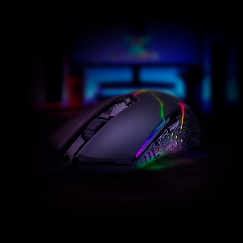 Redragon M601 Centrophorus RGB mouse from the right, highlighting the side grip texture and RGB lighting
