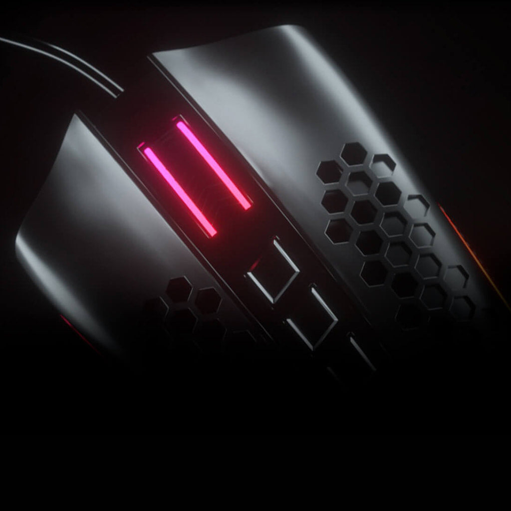  Redragon M988 Storm Elite gaming mouse in low light, focusing on the scroll wheel & top buttons with honeycomb shell visible