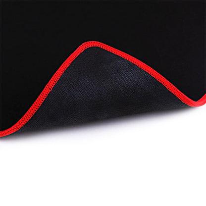 Close-up view showing the red stitched edge of the Redragon P002 Archelon Black Gaming Mousepad