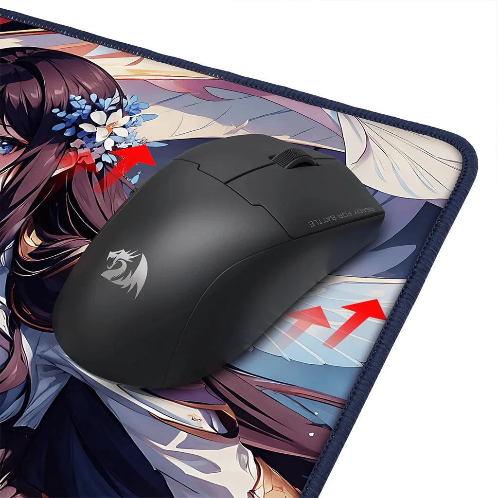 Black gaming mouse on an anime-style mouse pad with a detailed design