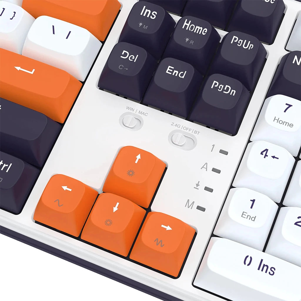 Close-up of a keyboard with orange and black keys