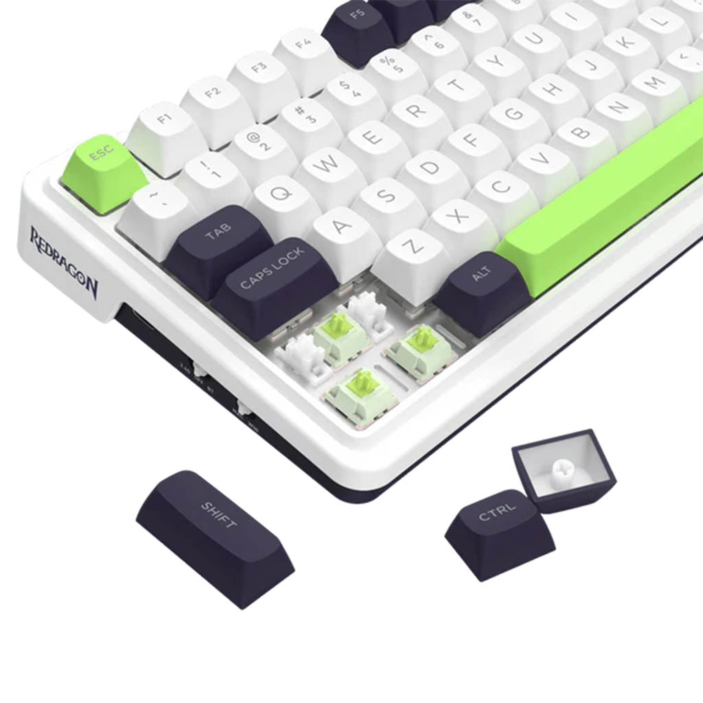 Mechanical keyboard with white and green keys on a white background