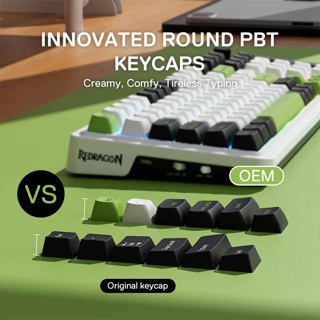 Keyboard with keycaps on a green surface, comparing Redragon and OEM keycaps.
